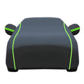 Black waterproof full car cover with green reflective trim, white background, all-weather outdoor car protection