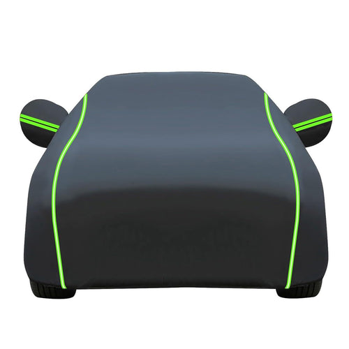 Black waterproof full car cover with green reflective trim, white background, all-weather outdoor car protection